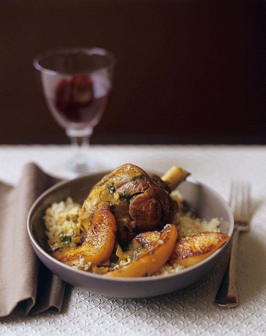 Roast Lamb Shank with Quince Over Couscous