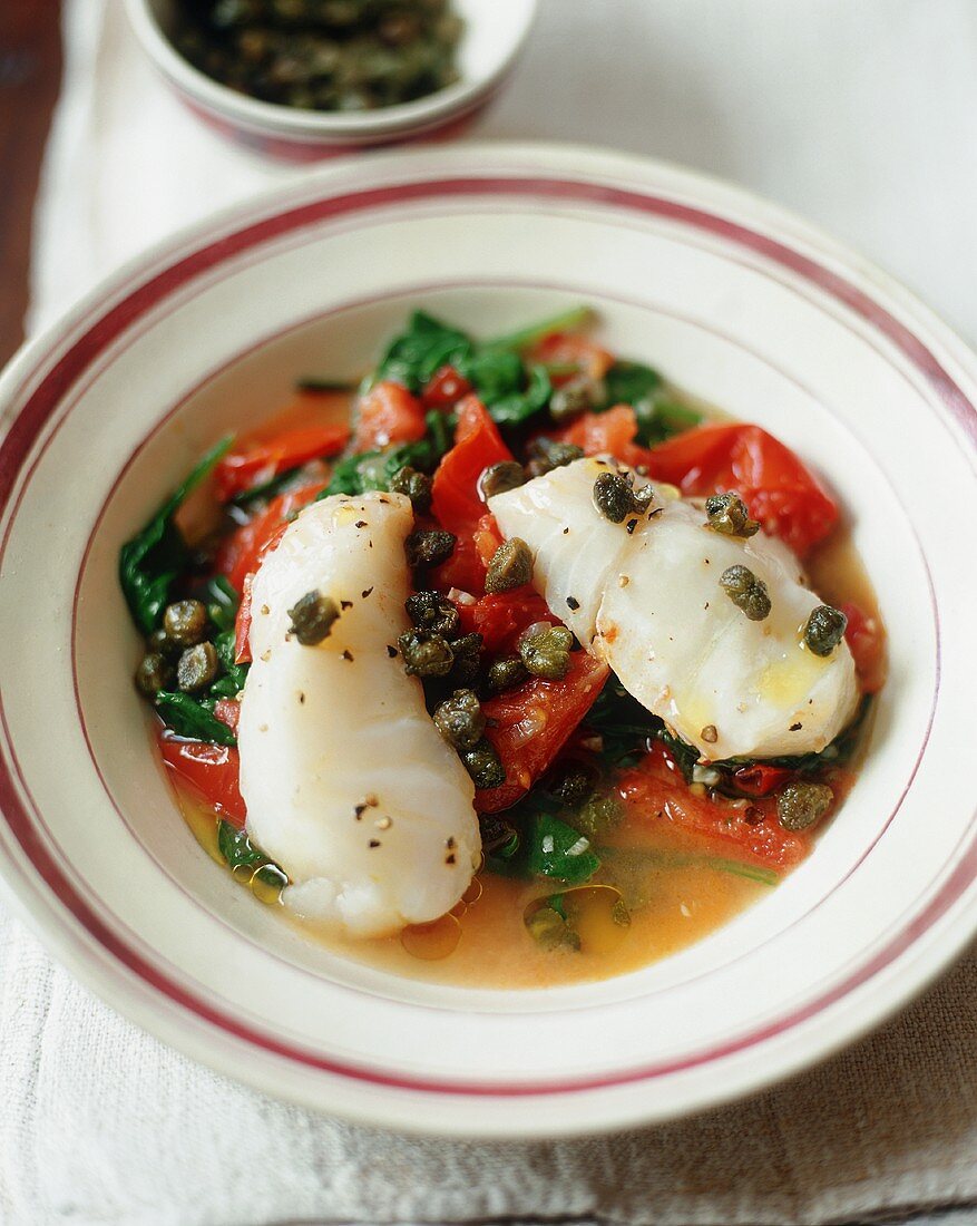 Seeteufel mit Tomaten und Kapern