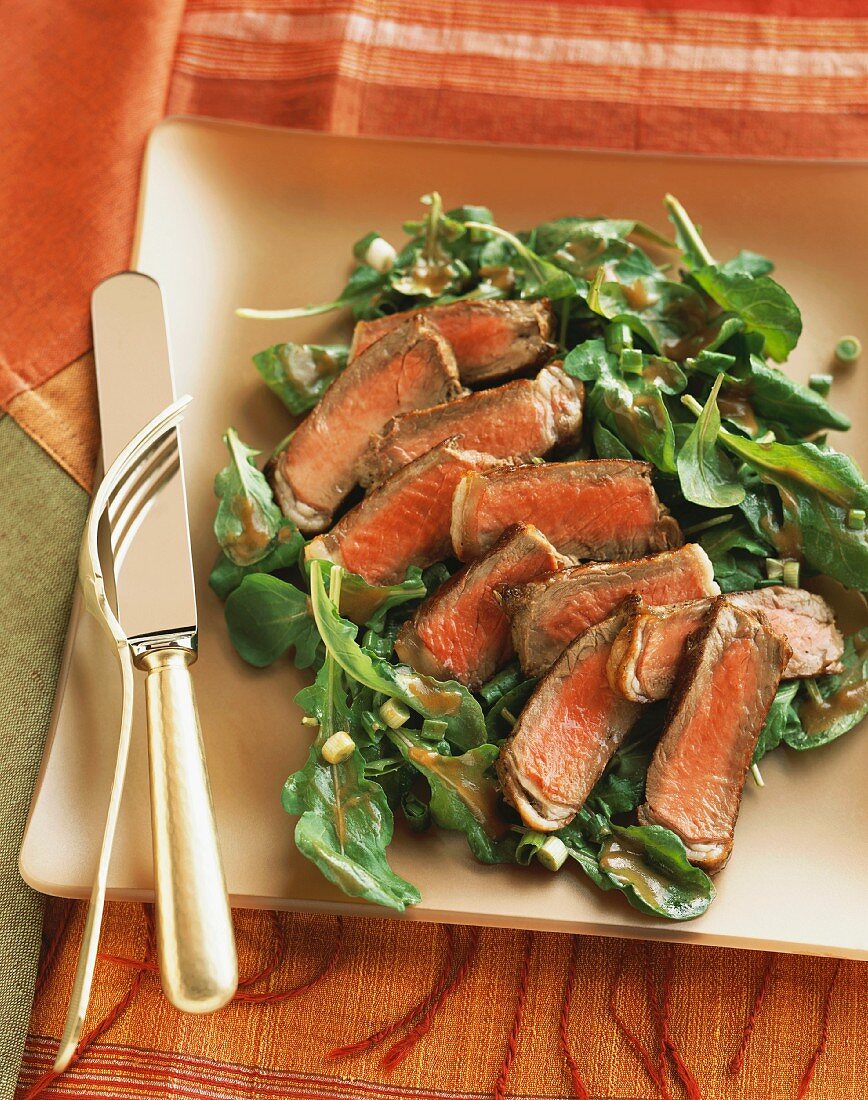 Sliced Steak and Arugula Salad