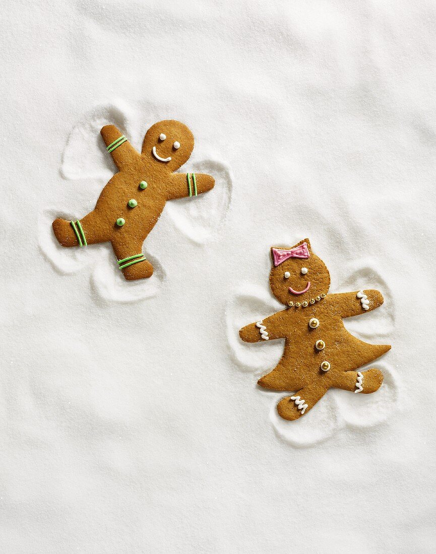 Two Gingerbread Cookies Making Snow Angels (No Exclusivity)
