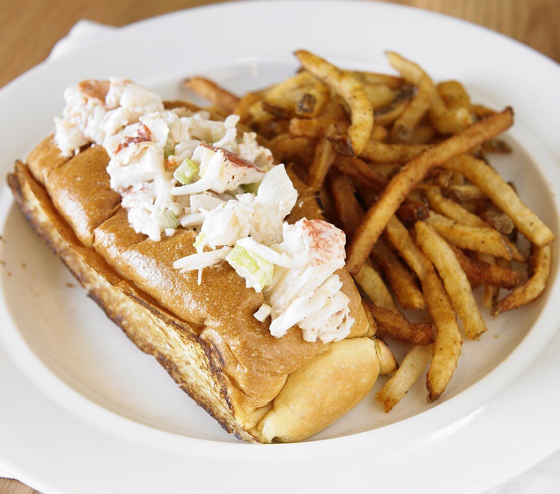 A Toasted Lobster Roll with French Fries