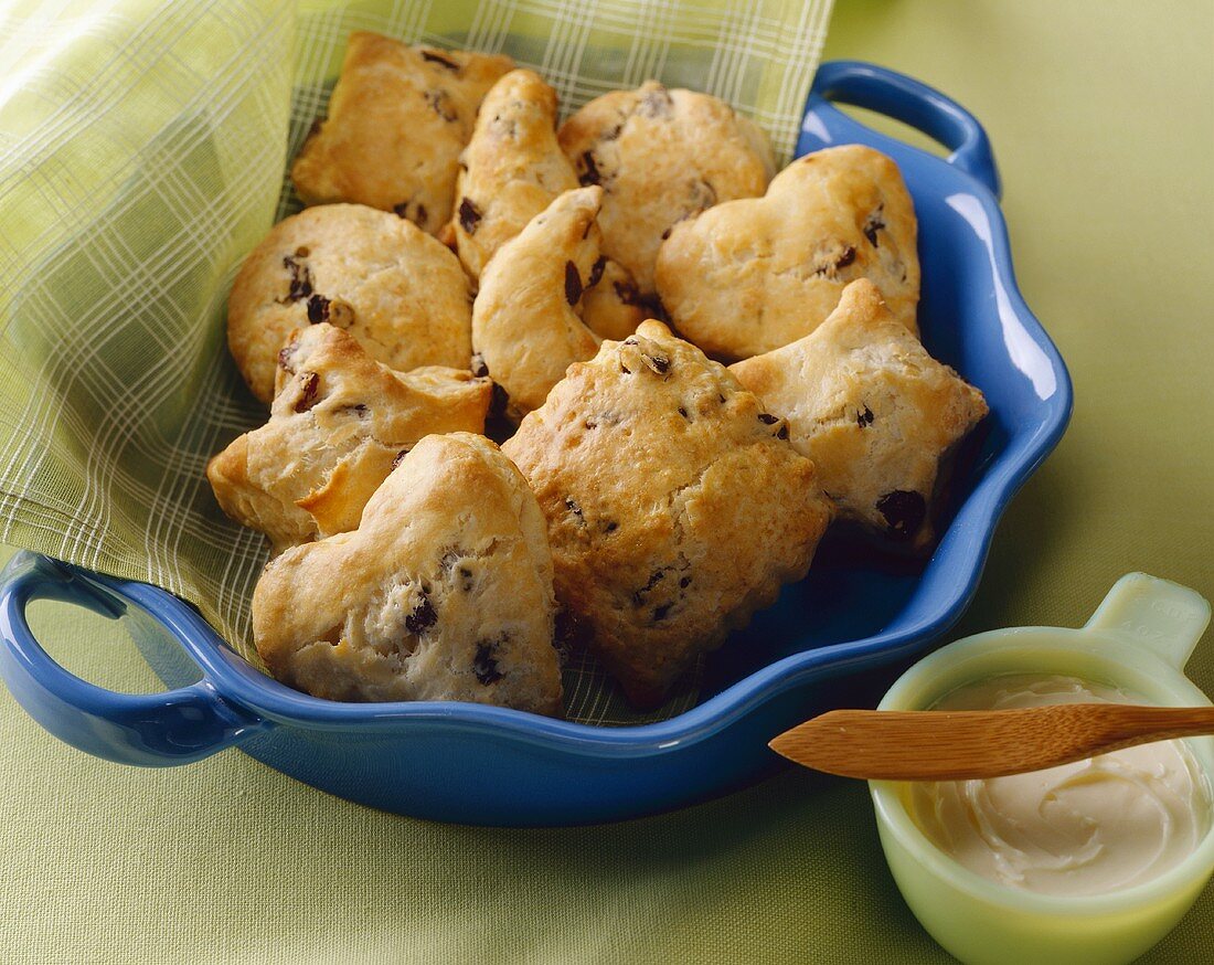 Raisin Scones in Fun Shapes in a Bowl; Butter