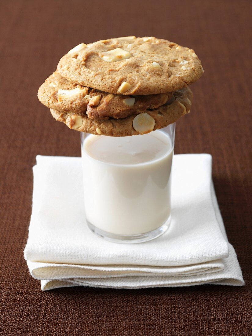 White Chocolate Chip Cookies on a Glass of Milk