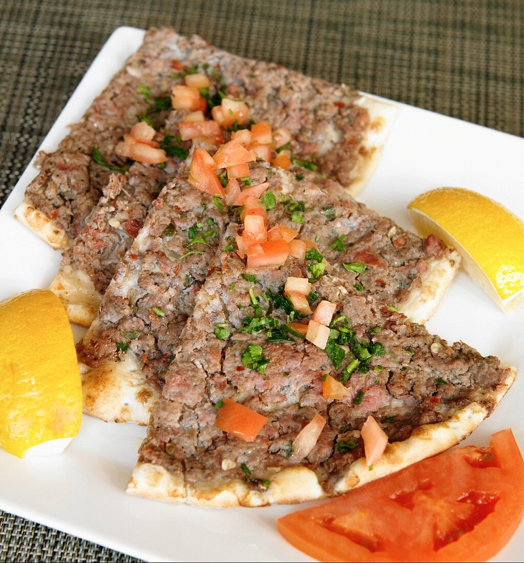 Baked Pita Topped with Ground Lamb and Tomato