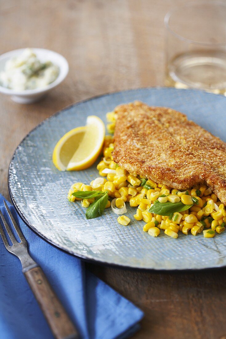 Flounder Fillet with Cornmeal Coating Over Corn