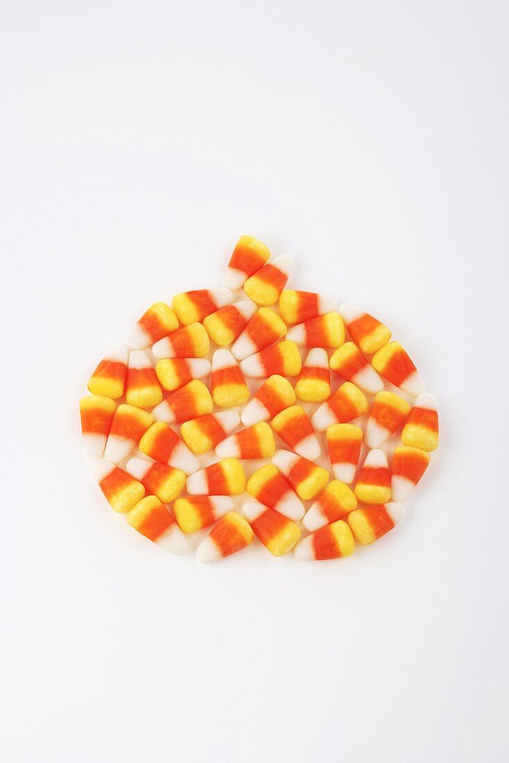 Many Candy Corns on a White Background