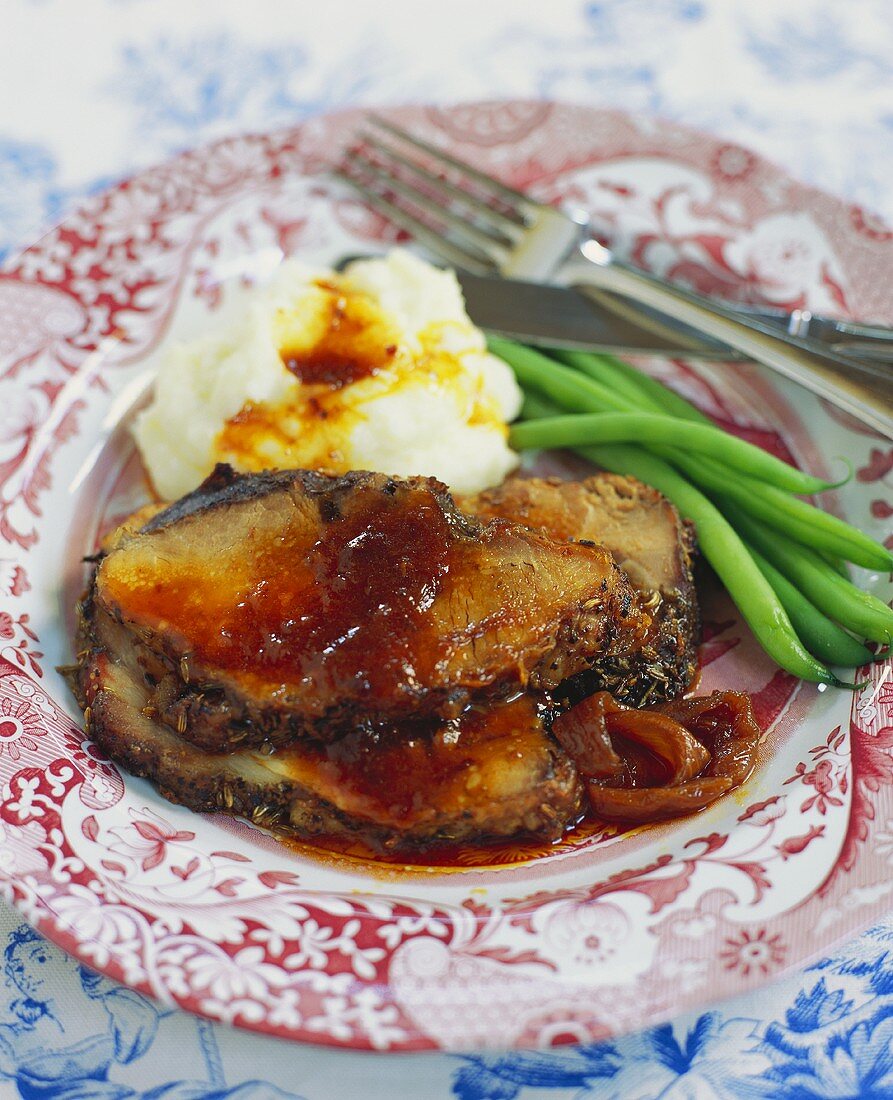 Sliced Roast Pork with Mashed Potatoes and Green Bean