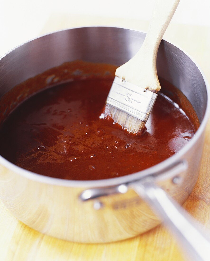 Barbecue Sauce in a Pan with Brush