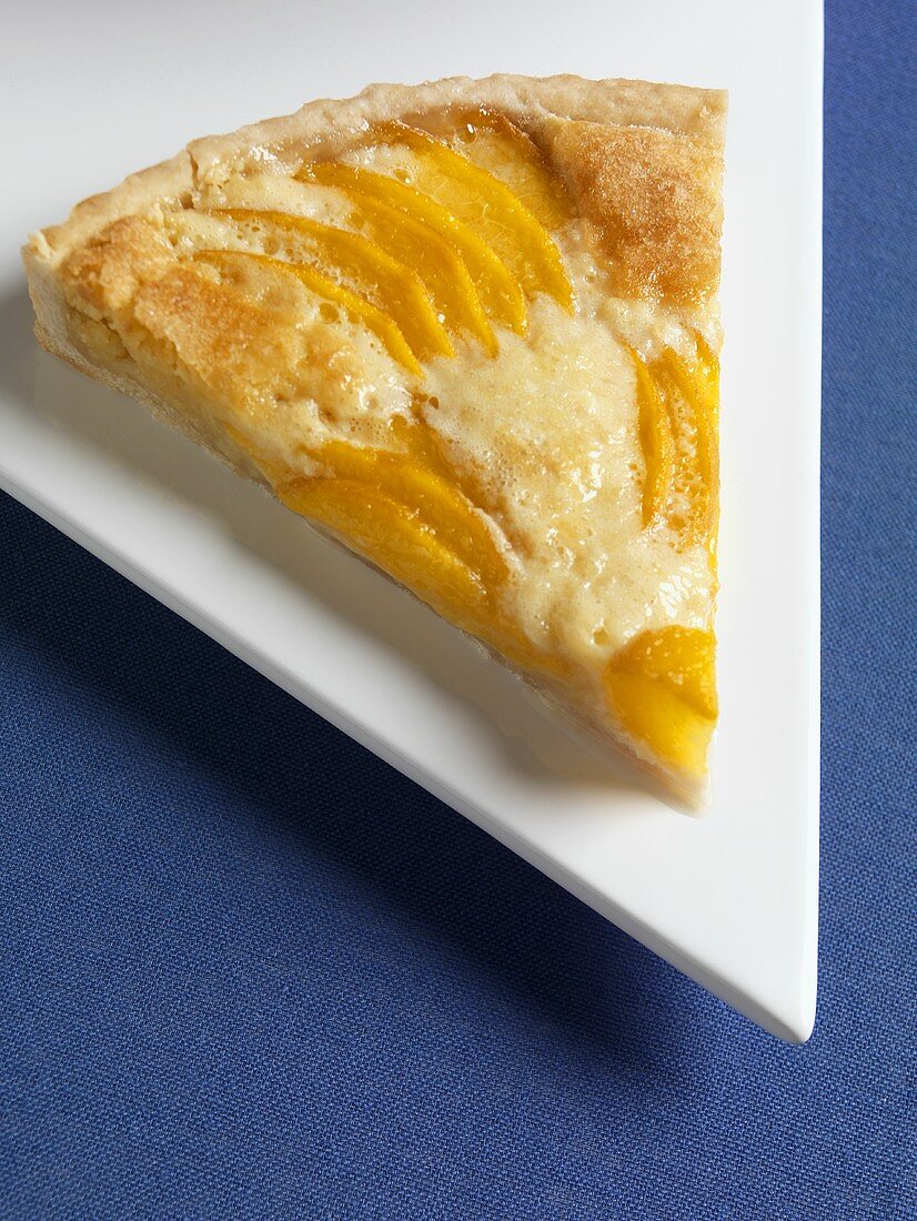 Slice of Peach Almond Tart