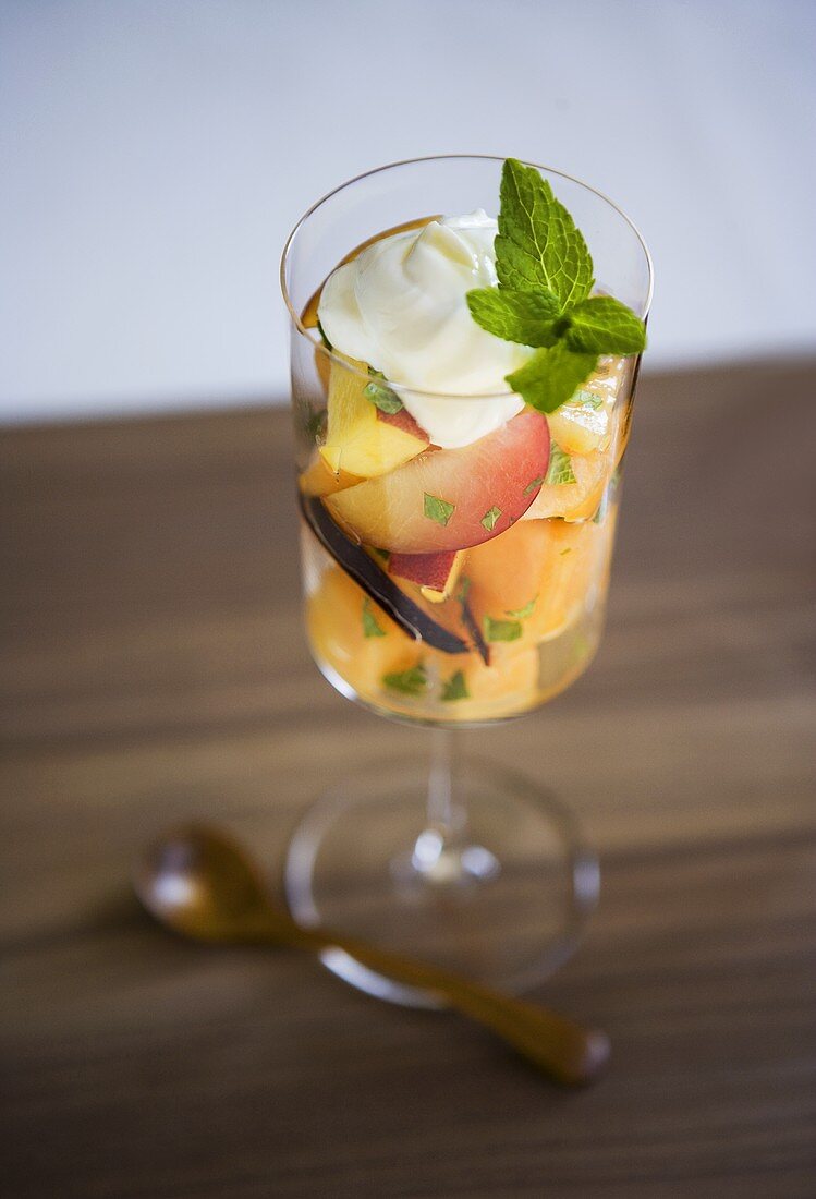 Fruit Salad in a Stem Glass with Mint Garnish