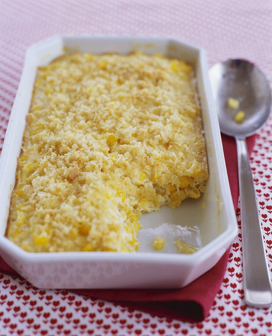 Corn Pudding in Serving Dish with Scoop Removed