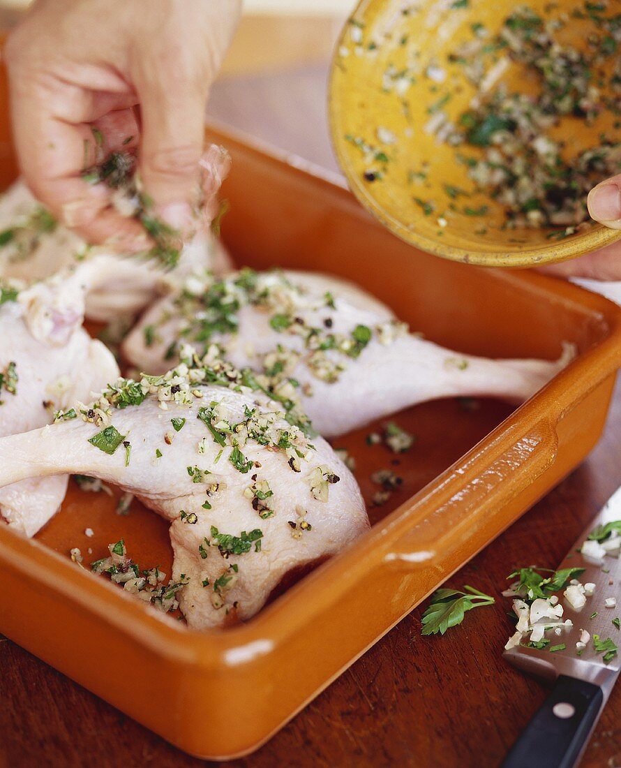 Seasoning Chicken with Garlic and Herbs