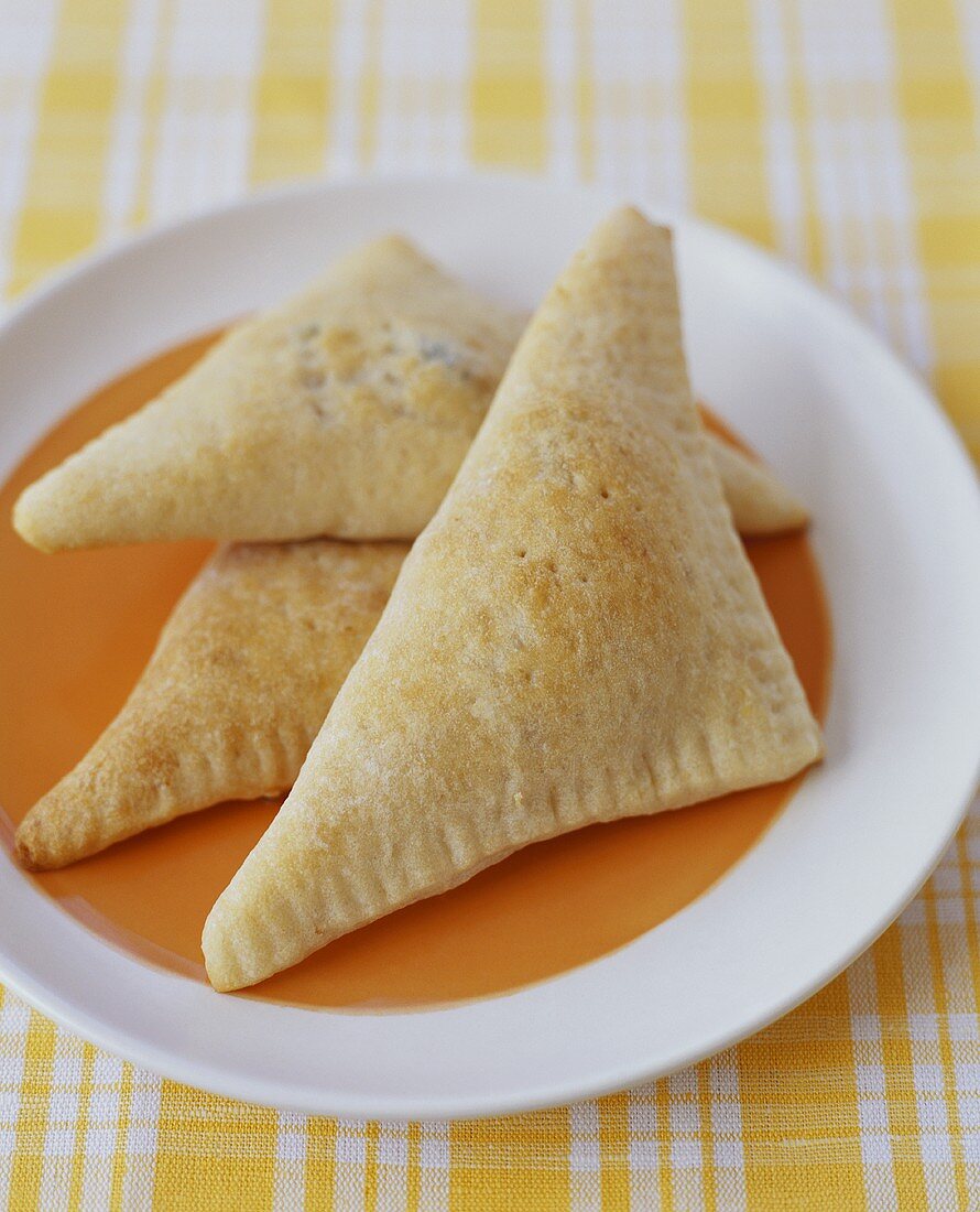 Filled Pastry Pockets on a Plate