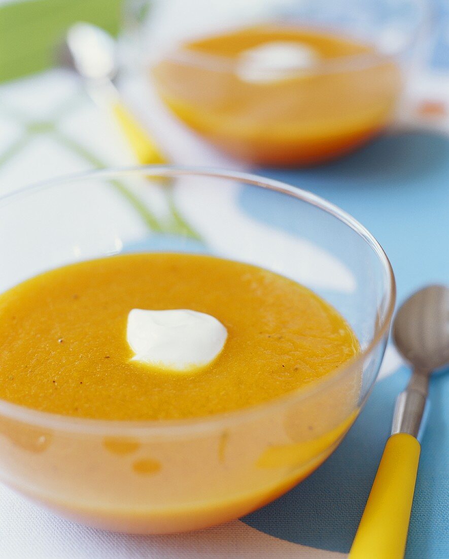 Bowl of Pumpkin Soup with Cream Dollop