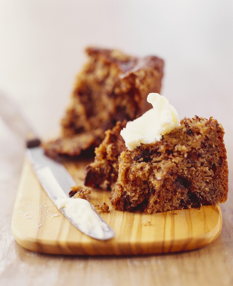 Apple Cake with Butter on Cutting Board