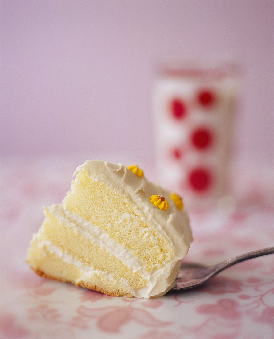 Small Piece of White Layer Cake on a Spoon