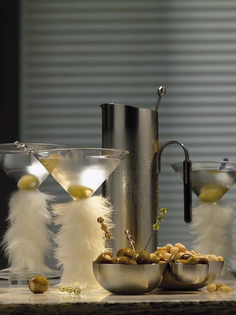 Martinis in glasses decorated with feathers