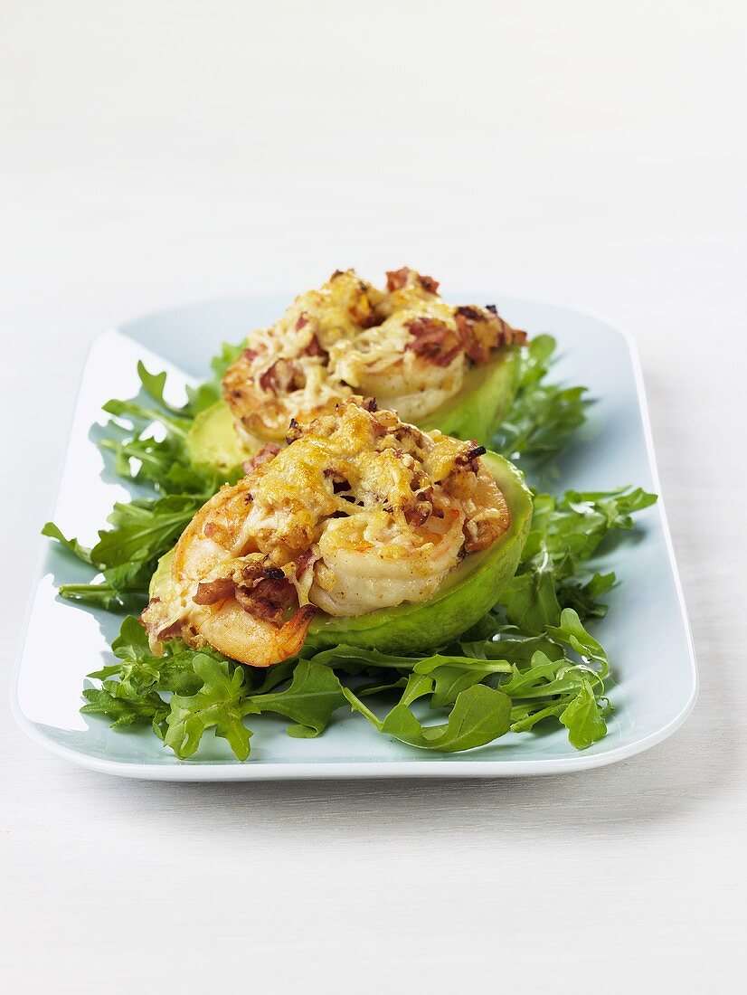 Prawns with melted cheese on avocado and rocket