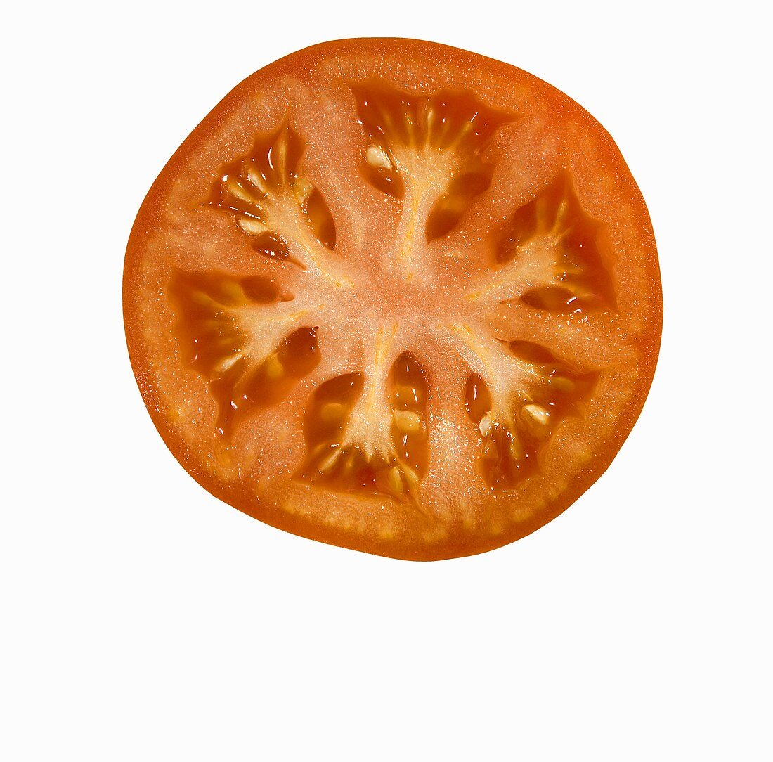 Tomato Slice on a White Backfgrouns