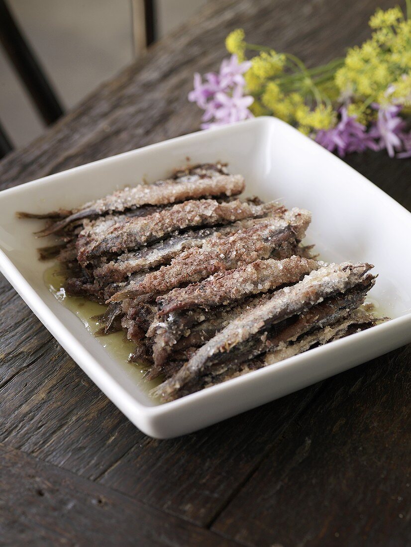 Sardines in a Serving Bowl on a Wooden Table