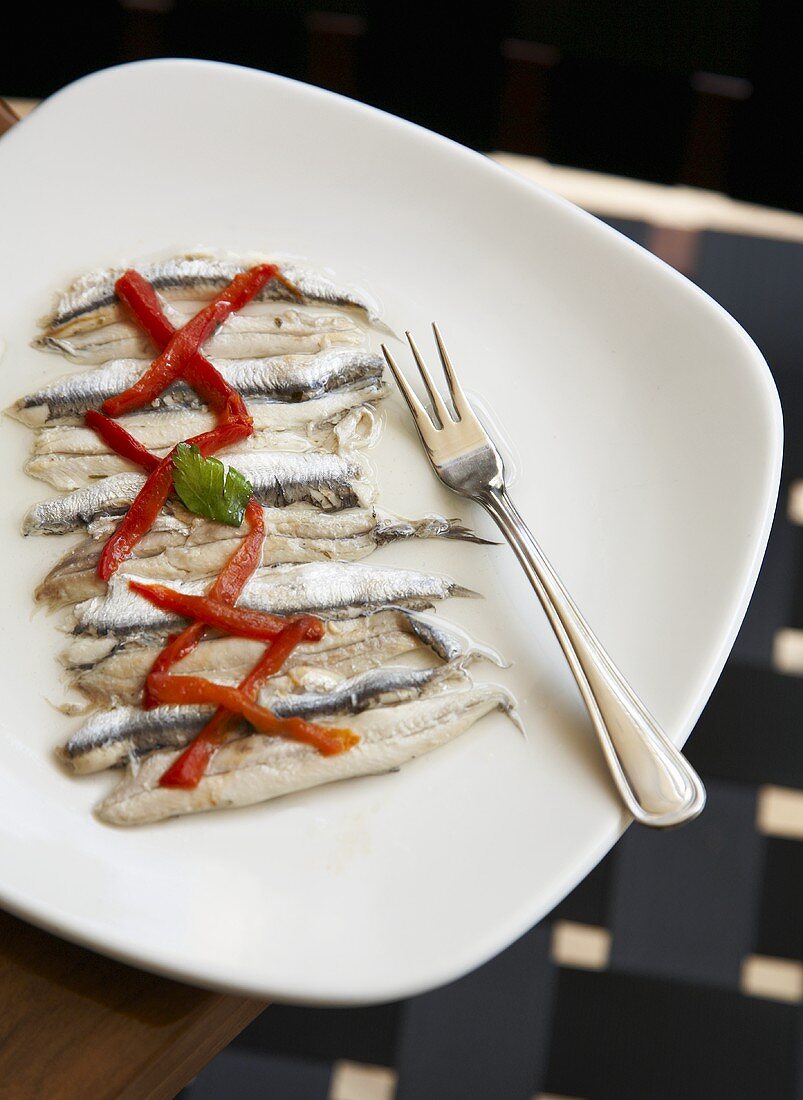 Anchovies with Roasted Red Peppers on a Plate