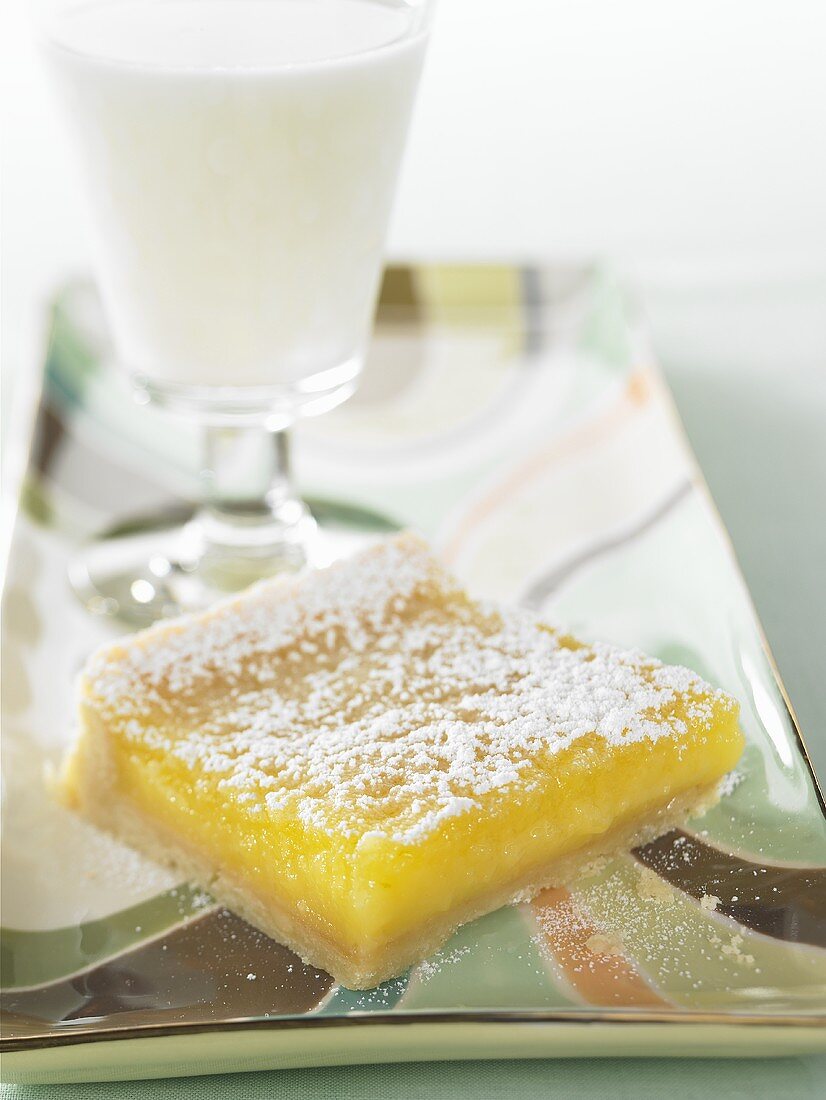 Lemon Square with a Glass of Milk
