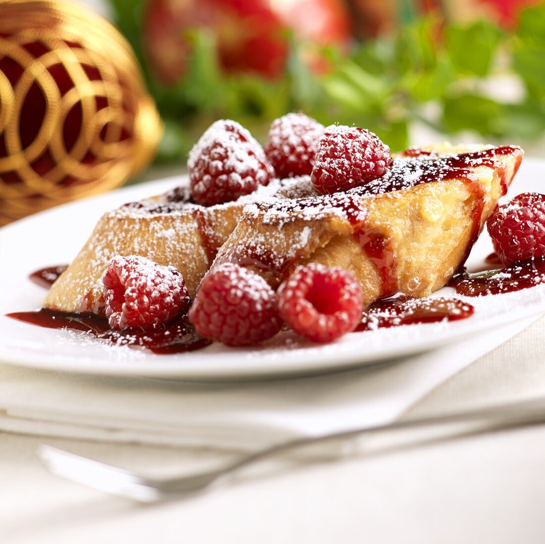 French Toast with Raspberry Sauce and Powdered Sugar