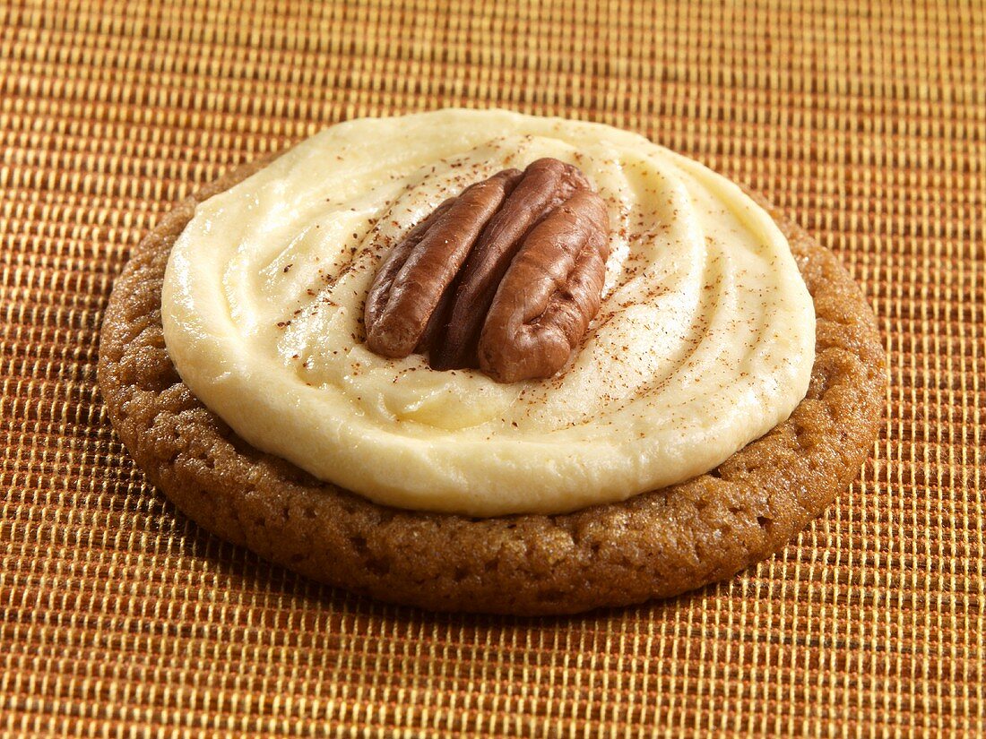 Ginger Snap with Pumpkin Cream Icing and Pecan