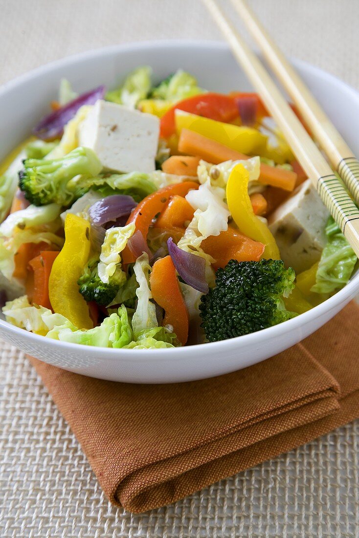 Tofu and Vegetable Stir Fry with Chopsticks