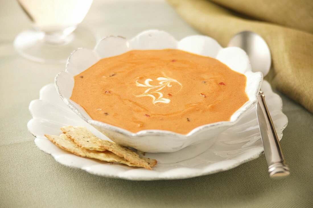 Bowl of Creamy Tomato Soup with Crackers