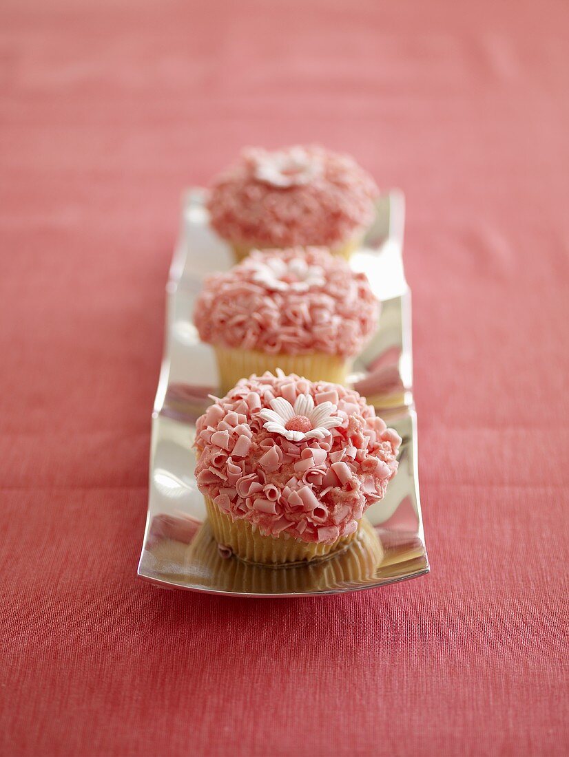 Drei rosa Cupcakes