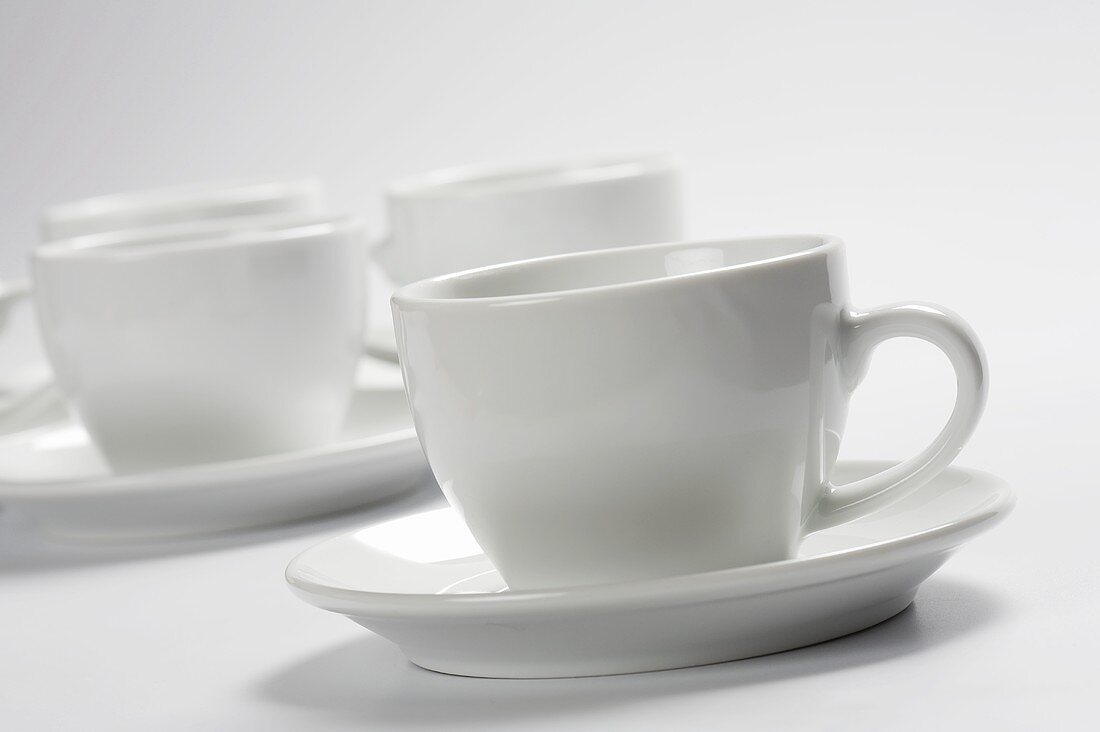 White Coffee Cups on Saucers