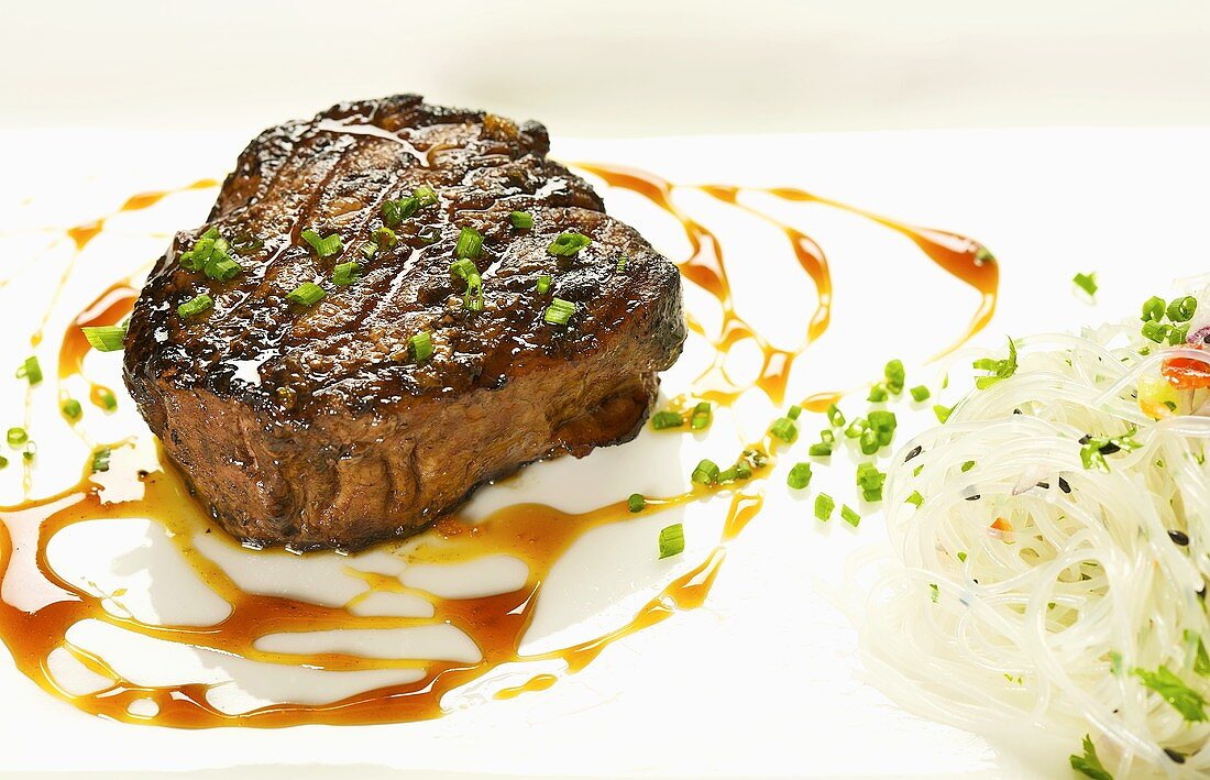 Grilled Steak with Scallion Garnish; Noodles