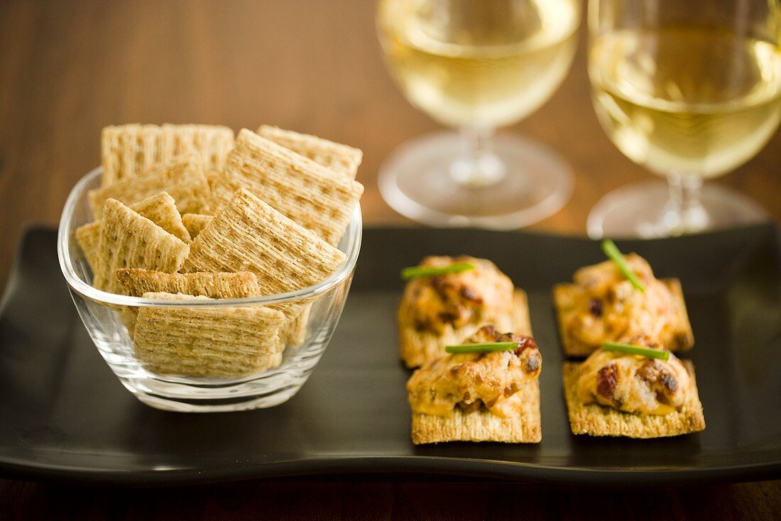 Bowl of Crackers with Cheese and Cracker Hors d'Oeuvres; Wine