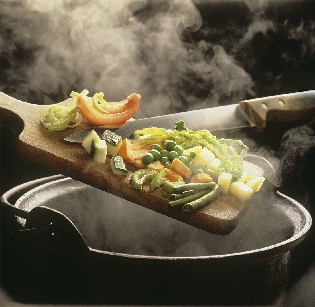 Dropping Fresh Vegetables into a Steaming Pot