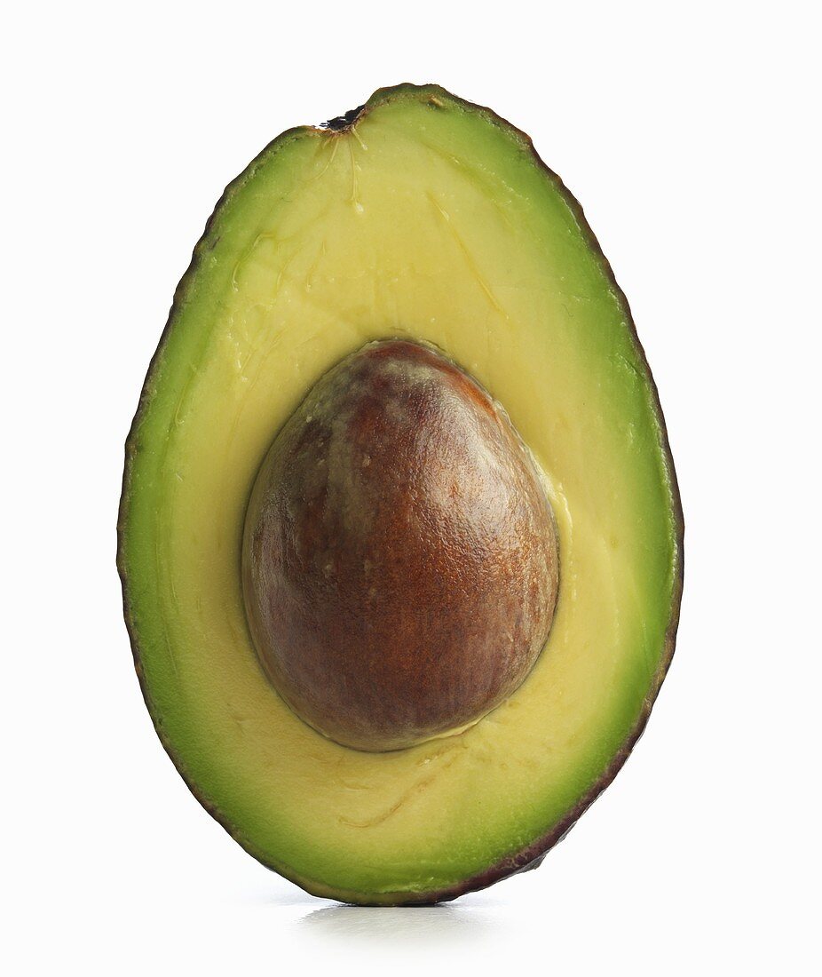 Half and Avocado with Pit; White Background
