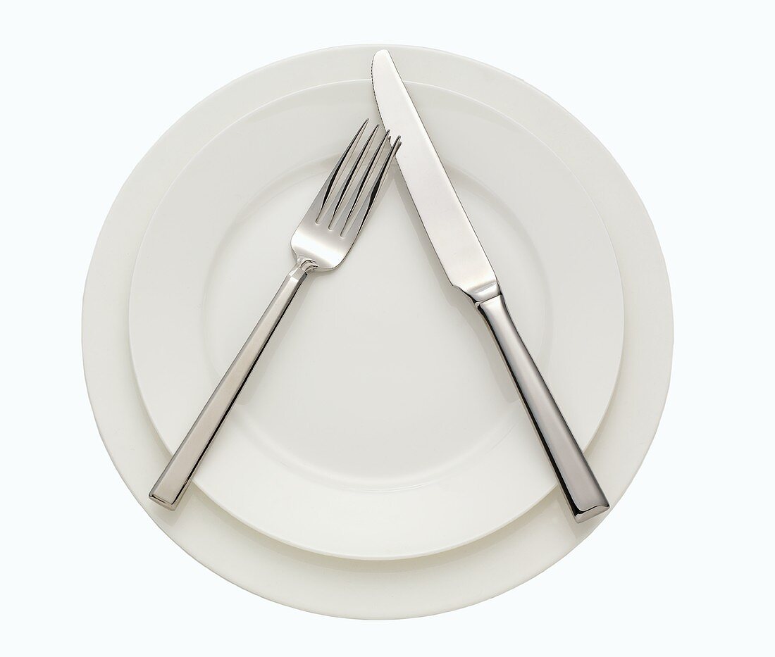 Place Setting with White Plates; Fork and Knife