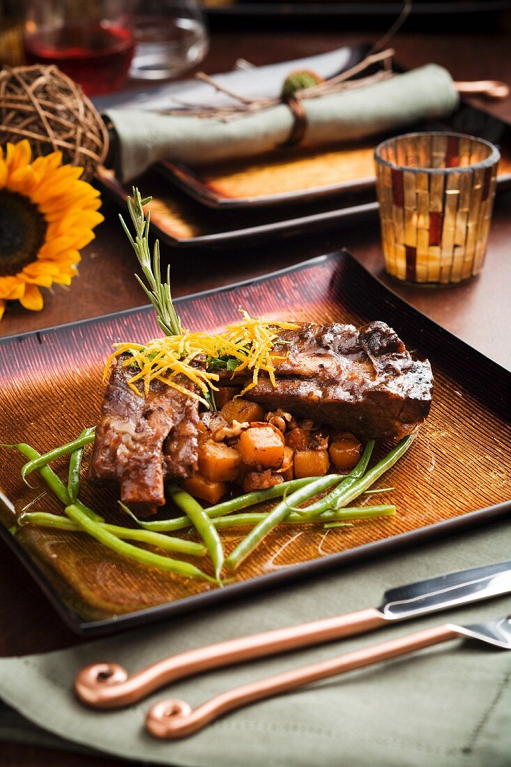 Beef Short Ribs Over Cubed Potatoes and Green Beans