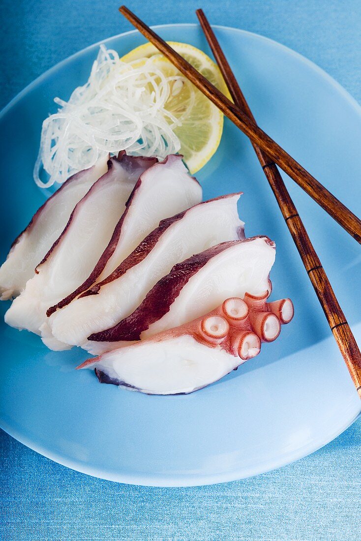 Octopus on a Blue Plate with Chopsticks
