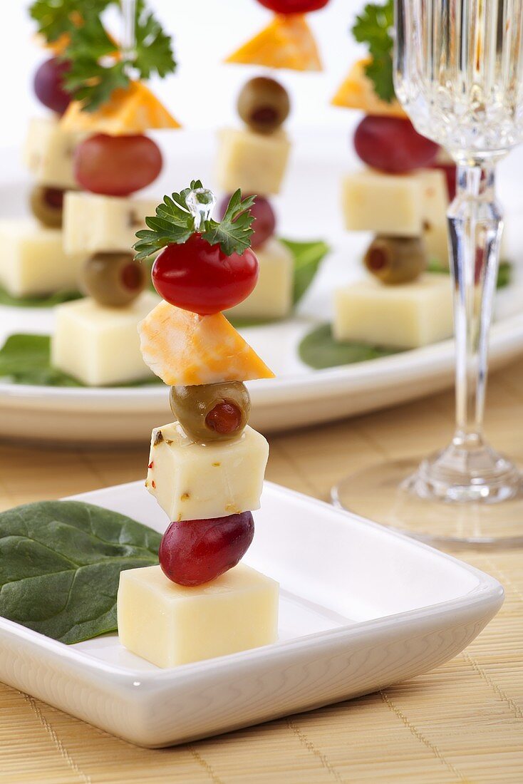 Three Cheese Canapes with Olives, Cherry Tomatoes and Grapes