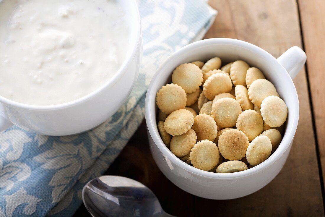 Cup of Oyster Crackers with Bowl of Clam Chowder
