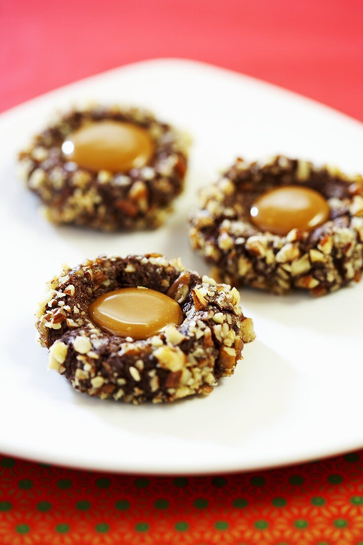 Chocolate and nut biscuits with caramel centre