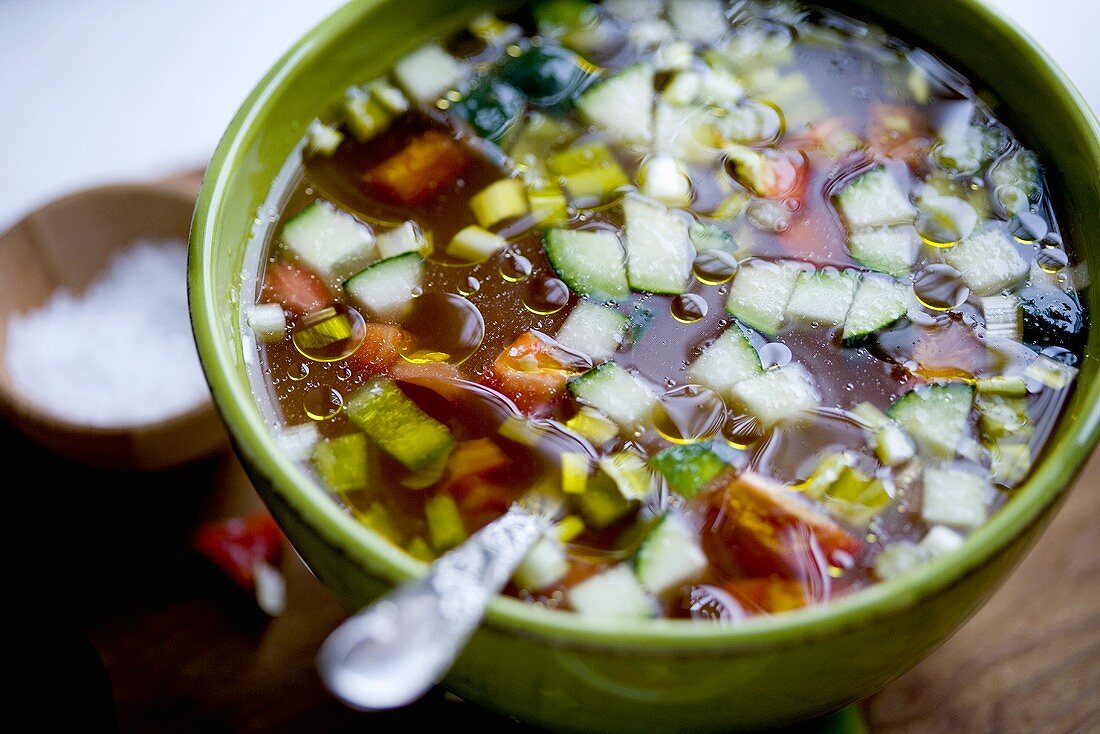 Bowl of Vegetable Soup with Spoon
