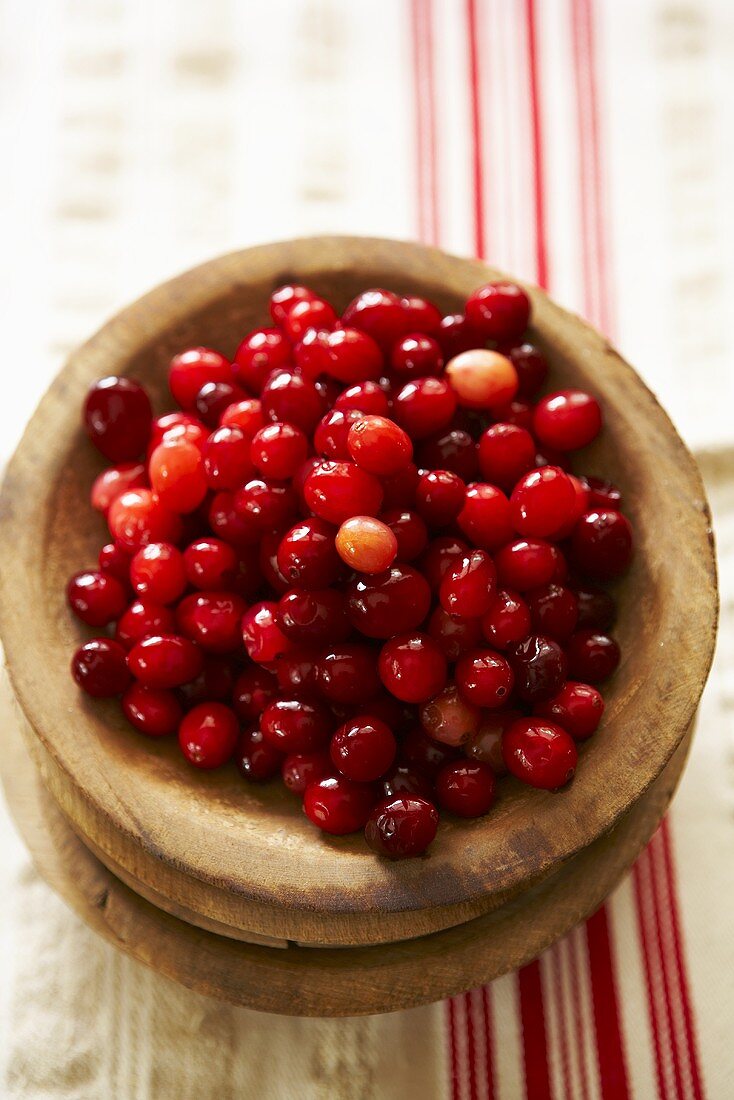 Fresh Cranberries in a Wooden Bowl