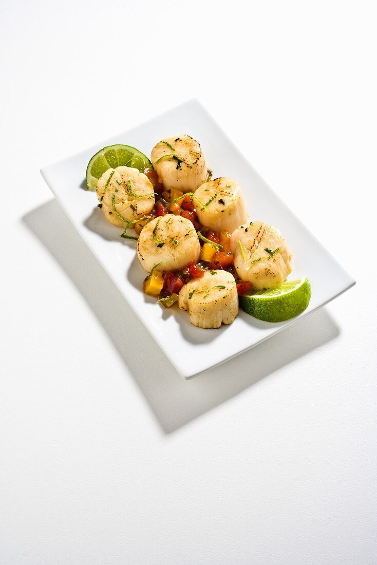 Lime Grilled Scallops on White Dish; White Background