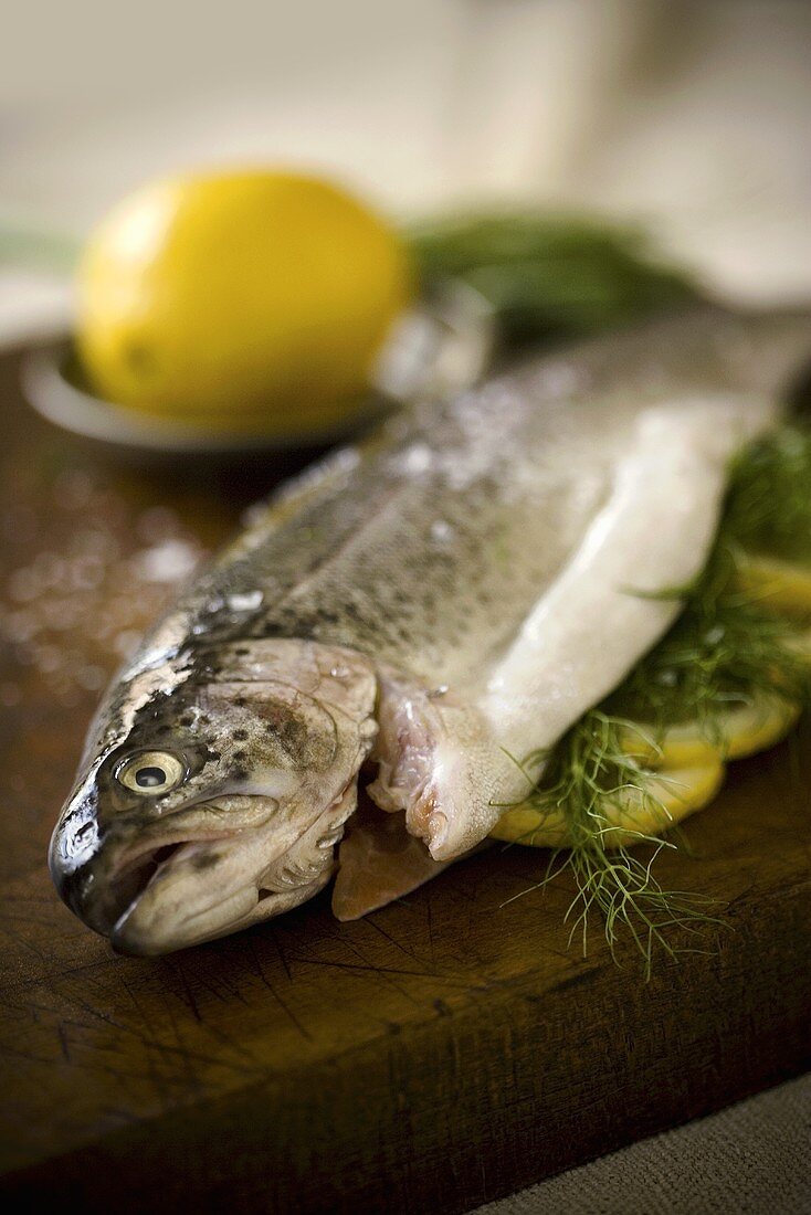 Dressed Trout with Lemon on Cutting Board