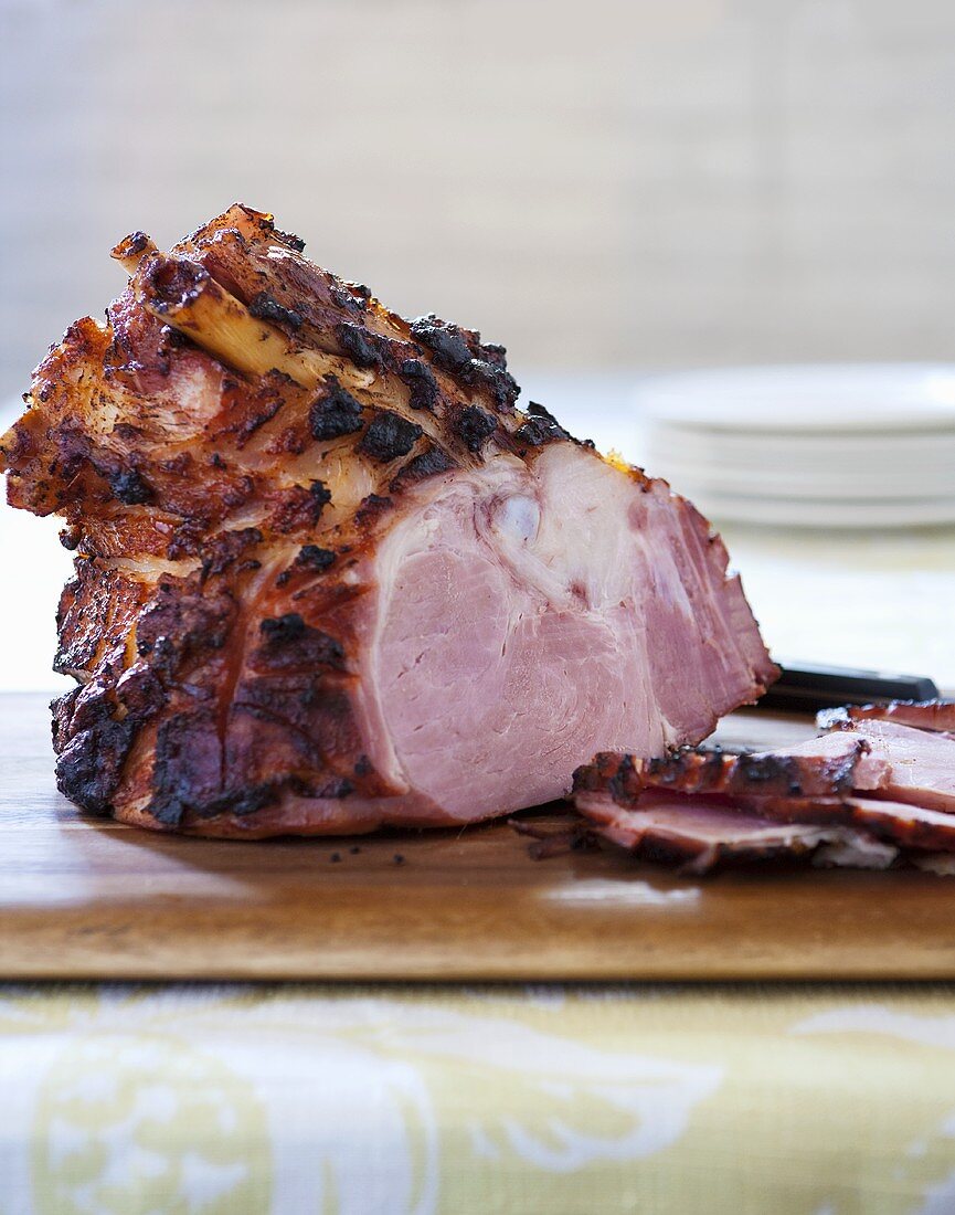 Grill Roasted Ham Sliced on Cutting Board