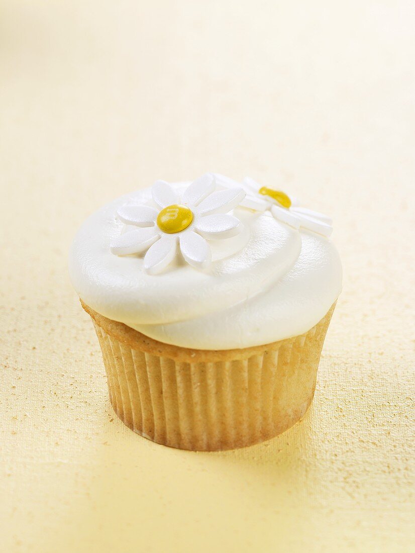 Vanilla Cupcake Frosted with Candy Daisies