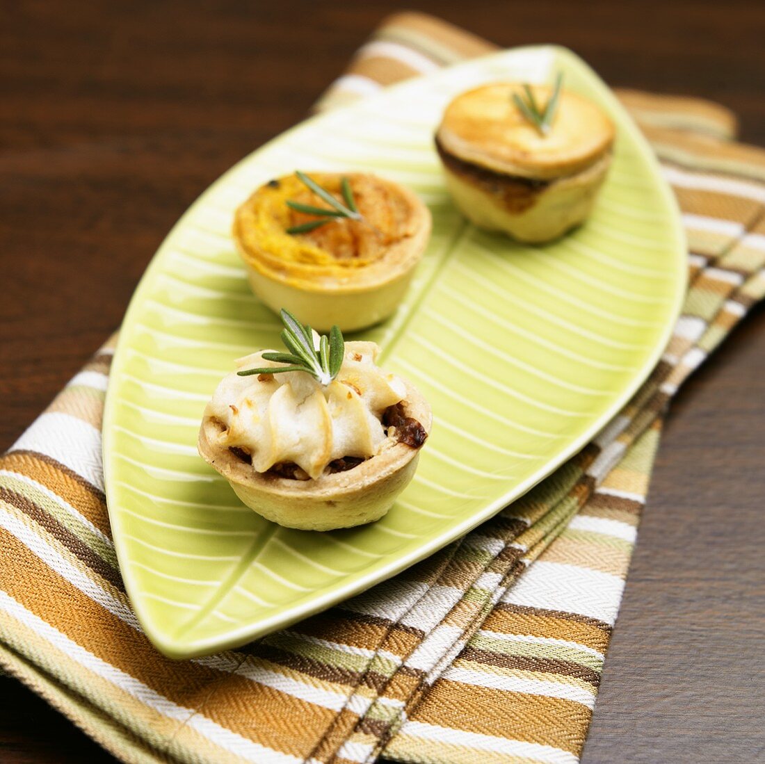 Mini Savory Tarts Topped with Rosemary; Beef, Shrimp and Mushroom