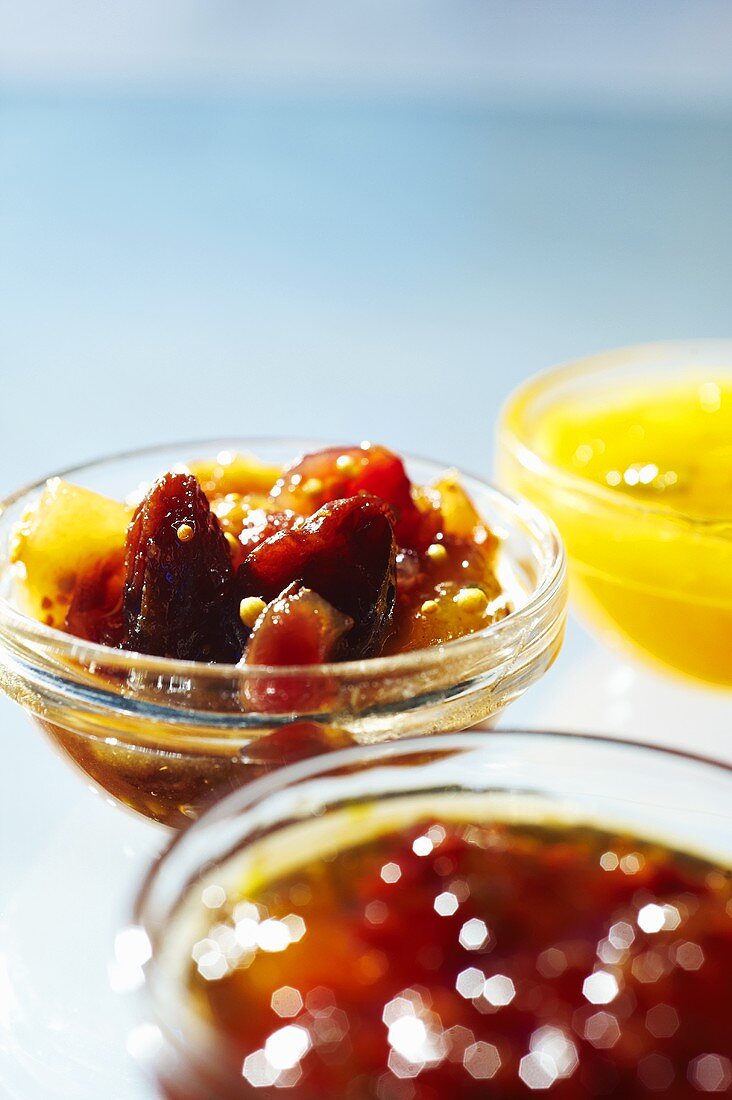 Three Bowls of Assorted Fruit Preserves
